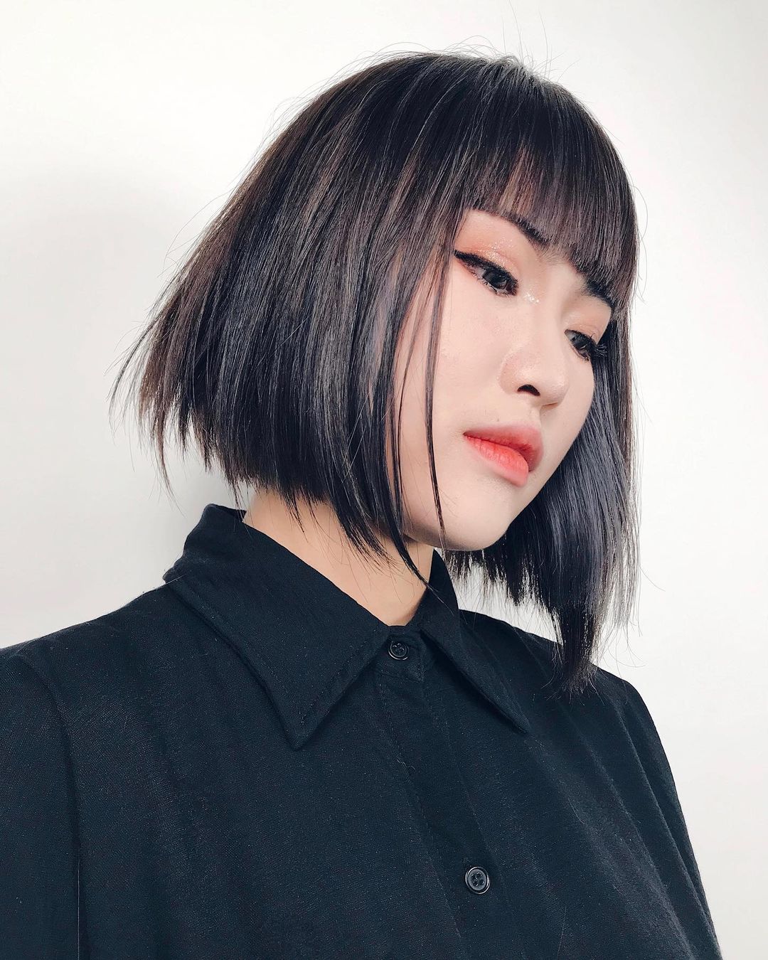 choppy sleek bob with fringe