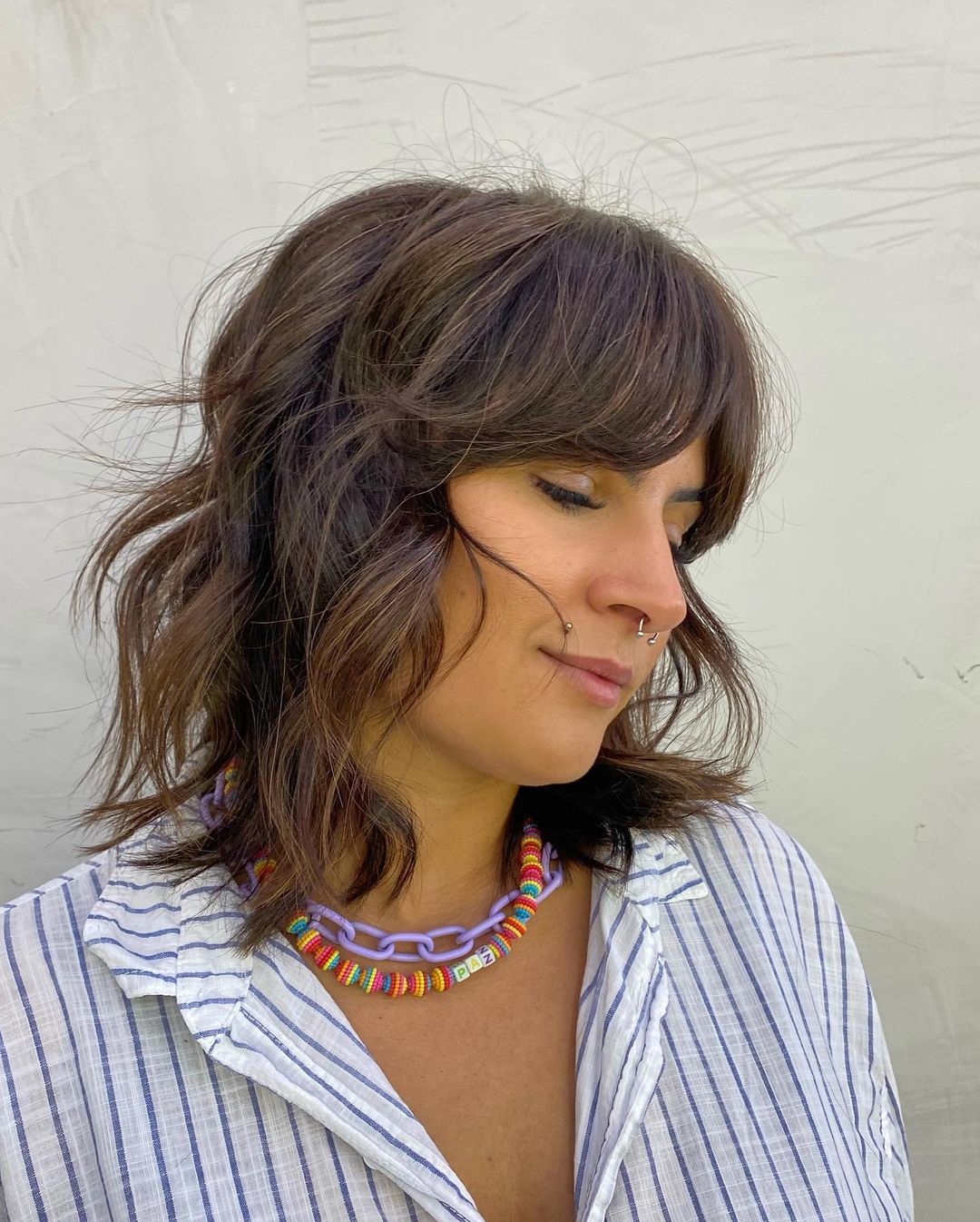 shaggy layered bob with bangs