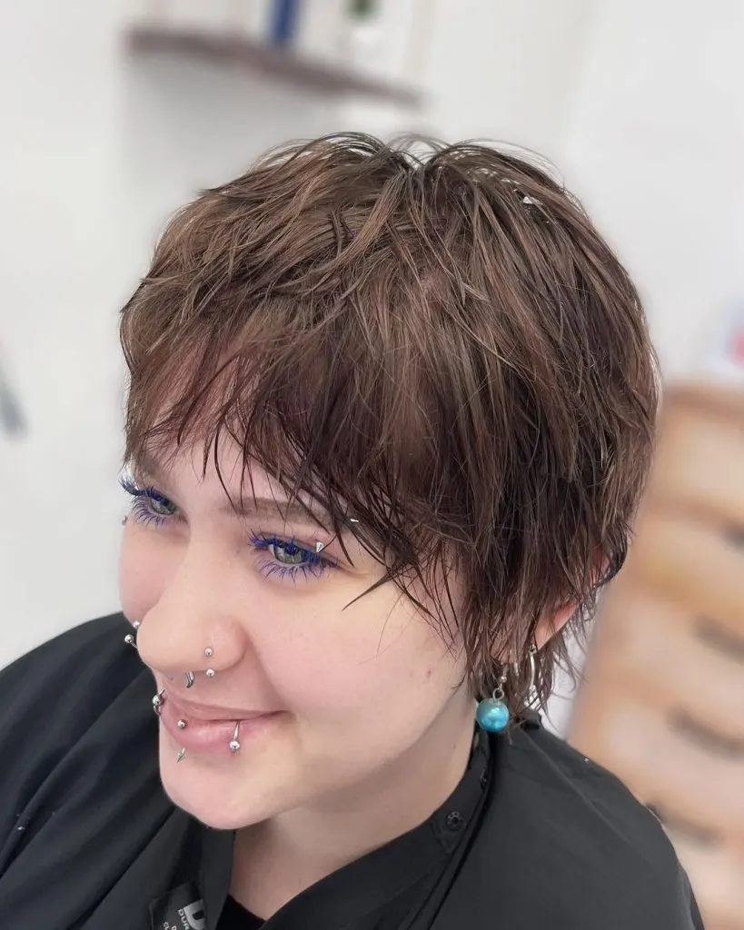 Brown pixie cut with bangs