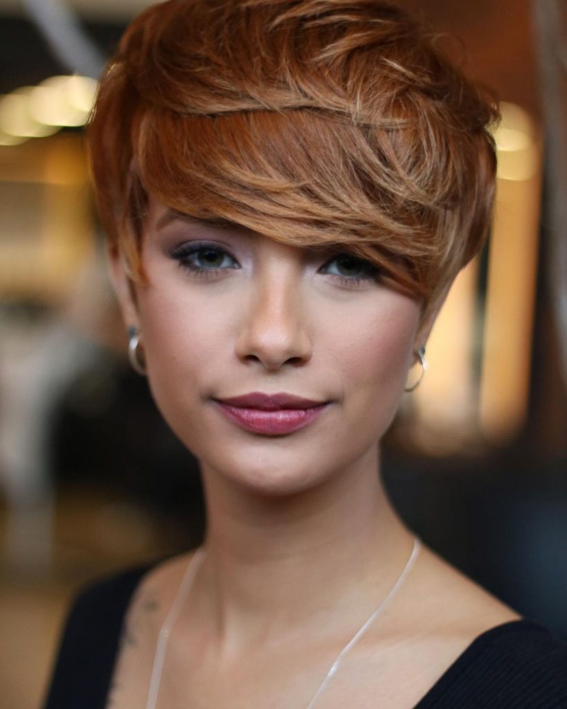 copper long pixie cut with bangs