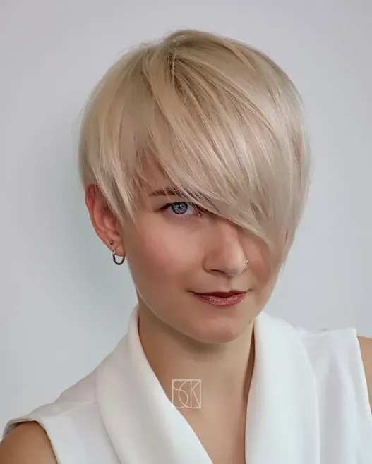long pixie cut with eye-covering bangs