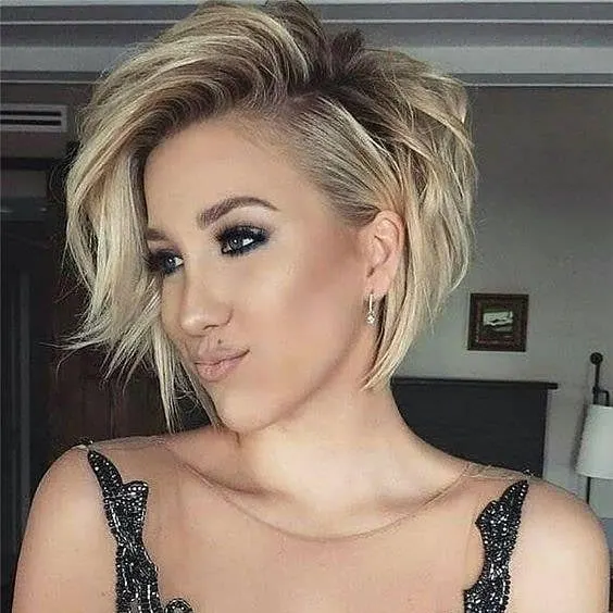 blonde long pixie cut with bangs