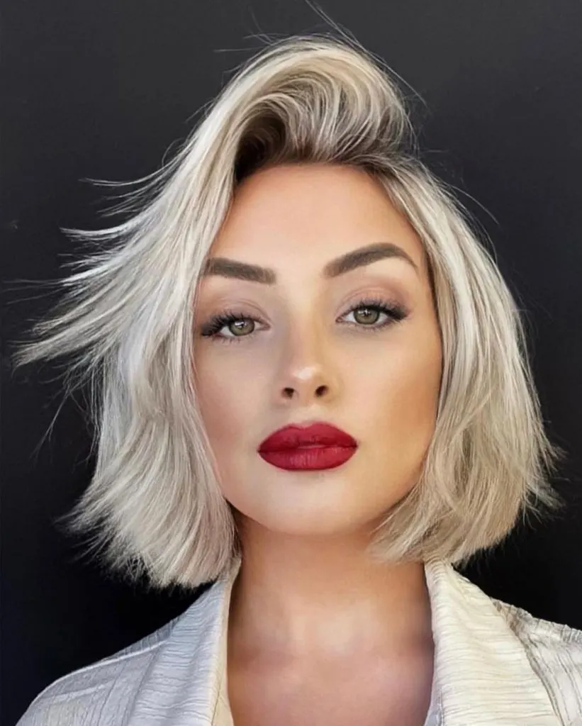 short blonde bob with side part