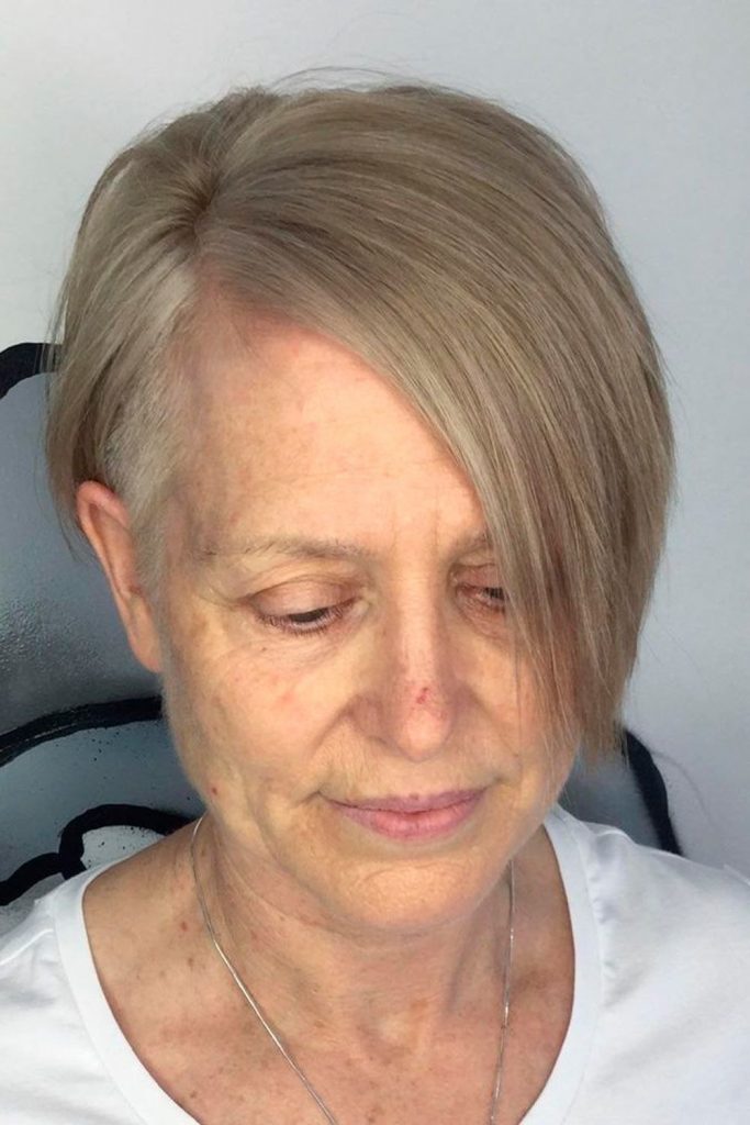 side parted pixie cut with undercut for women over 60