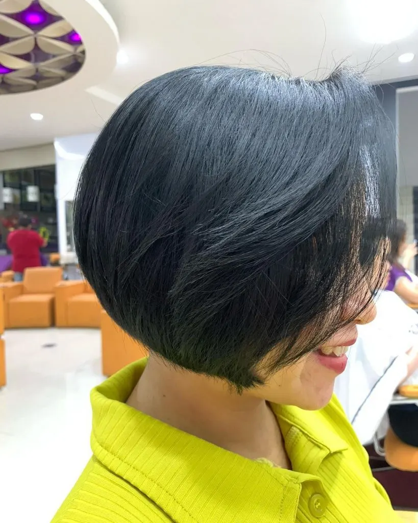 sleek rounded bob with side bangs