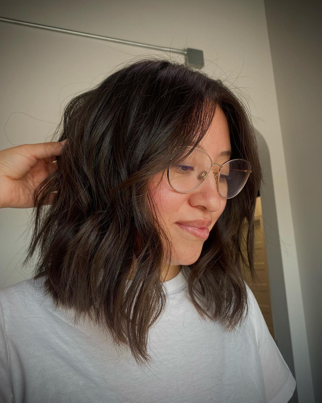 textured lob with curtain bangs