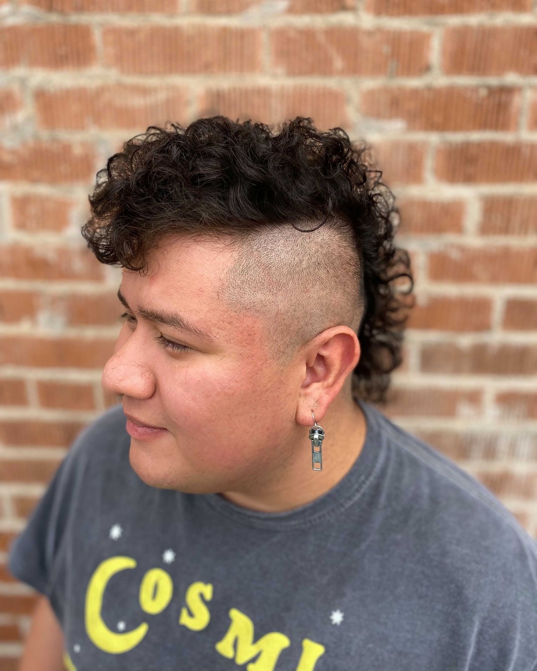 curly mullet with shaved sides