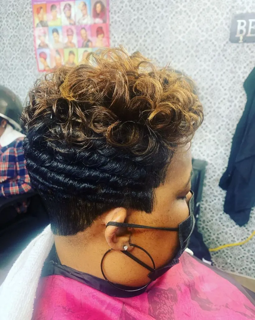 blonde and black curly pixie cut