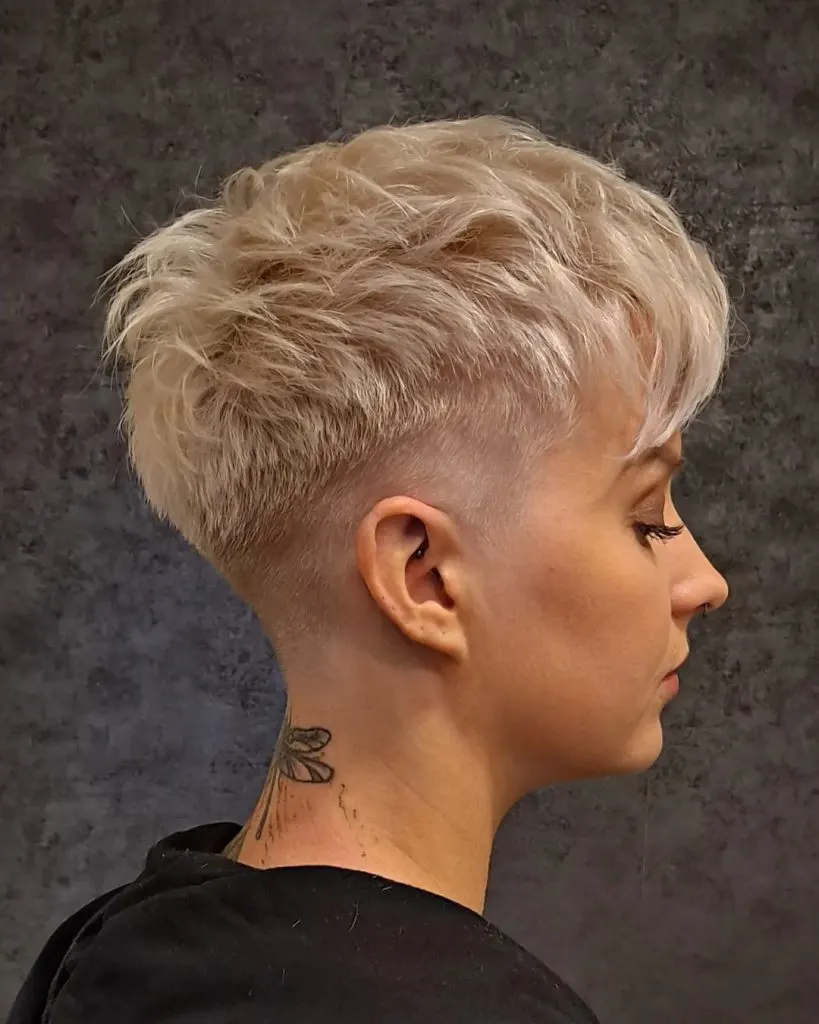 blonde pixie cut with shaved sides