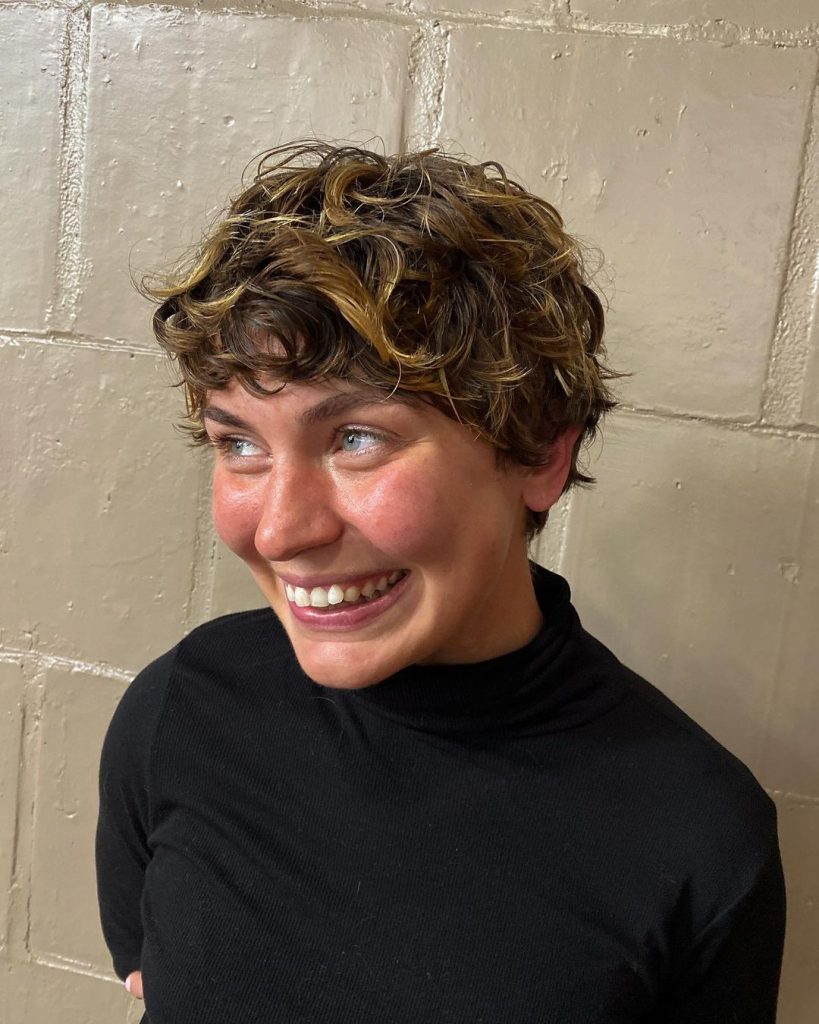 curly pixie cut for dark hair and blonde highlights