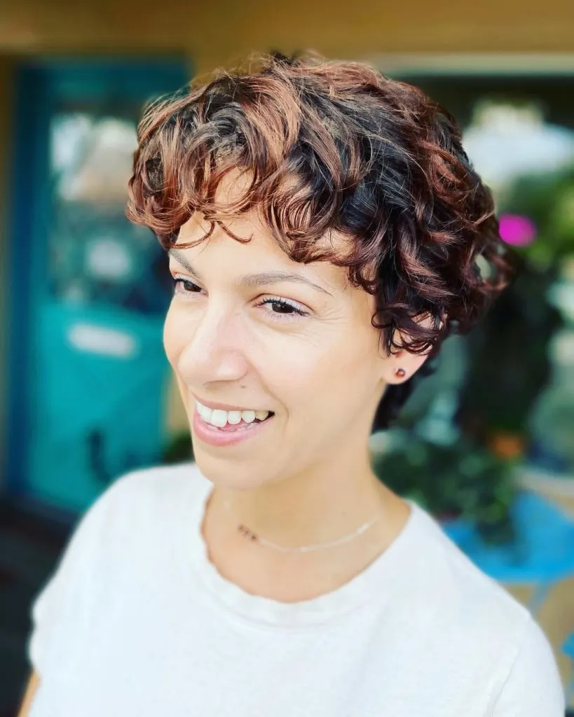 curly pixie cut with highlights