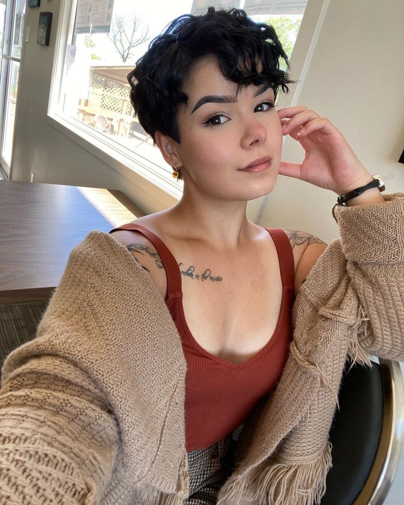 curly pixie cut with low maintenance bangs