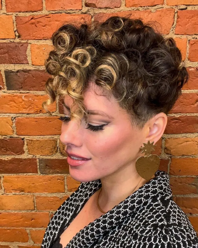 dark curly pixie cut with blonde bangs