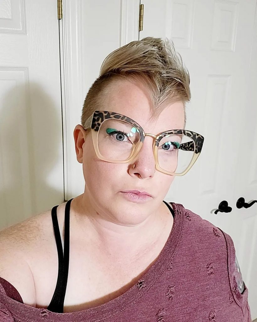 edgy blonde pixie mohawk with bangs