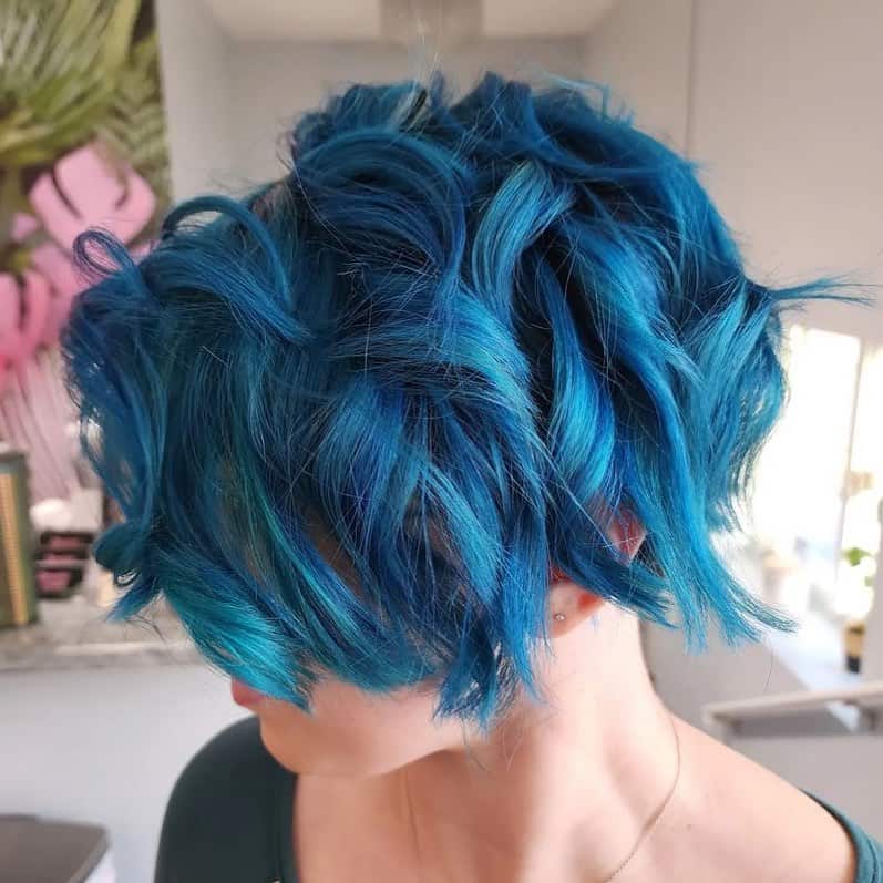 edgy long curly pixie for round face
