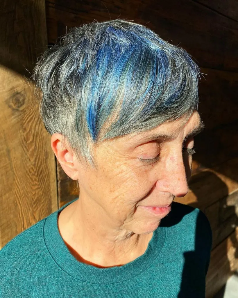 gray pixie cut with blue highlights