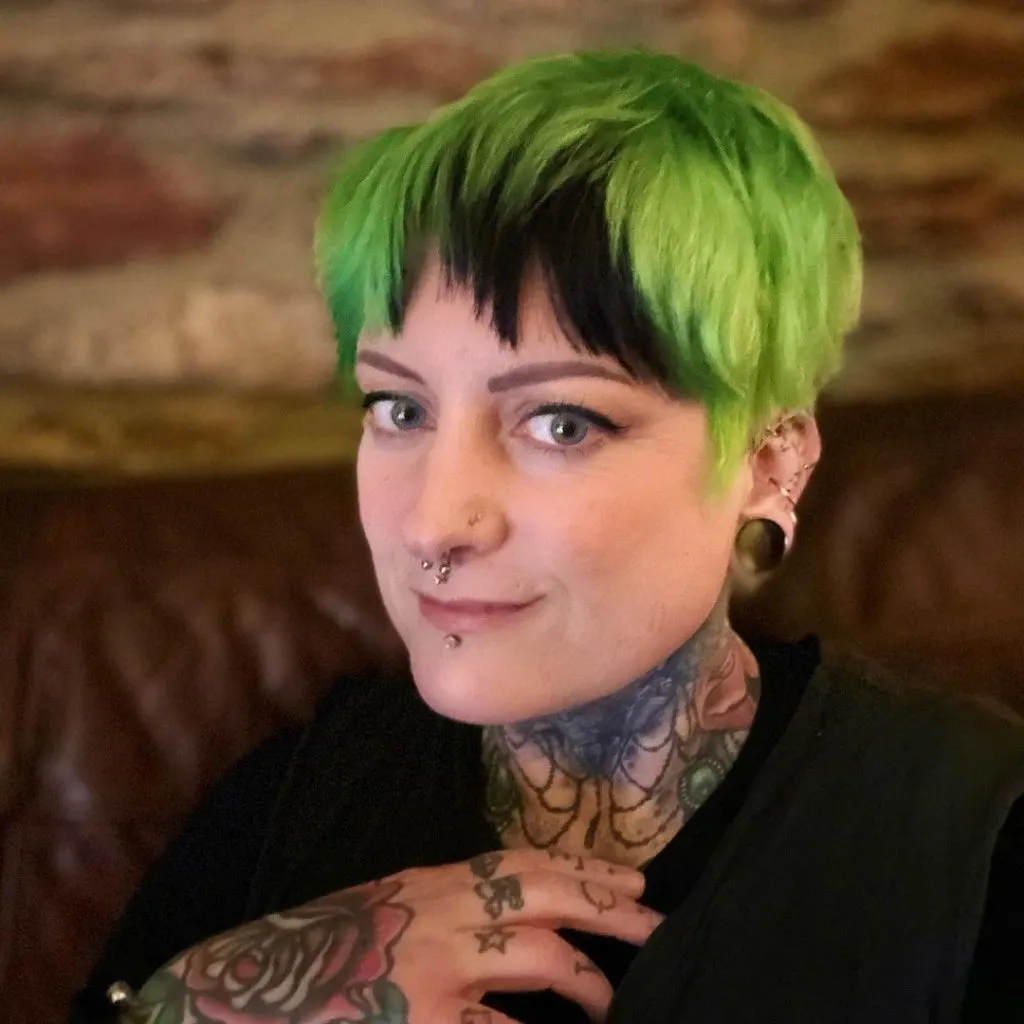 green and black pixie cut