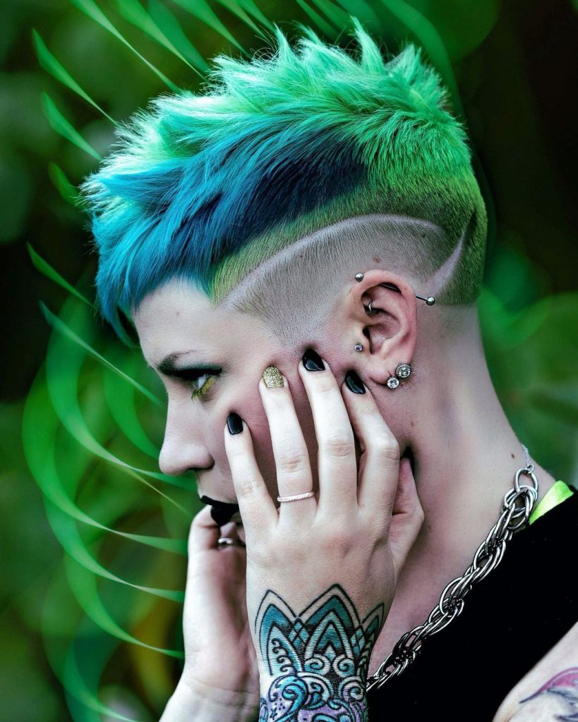 green and blue pixie cut with fades