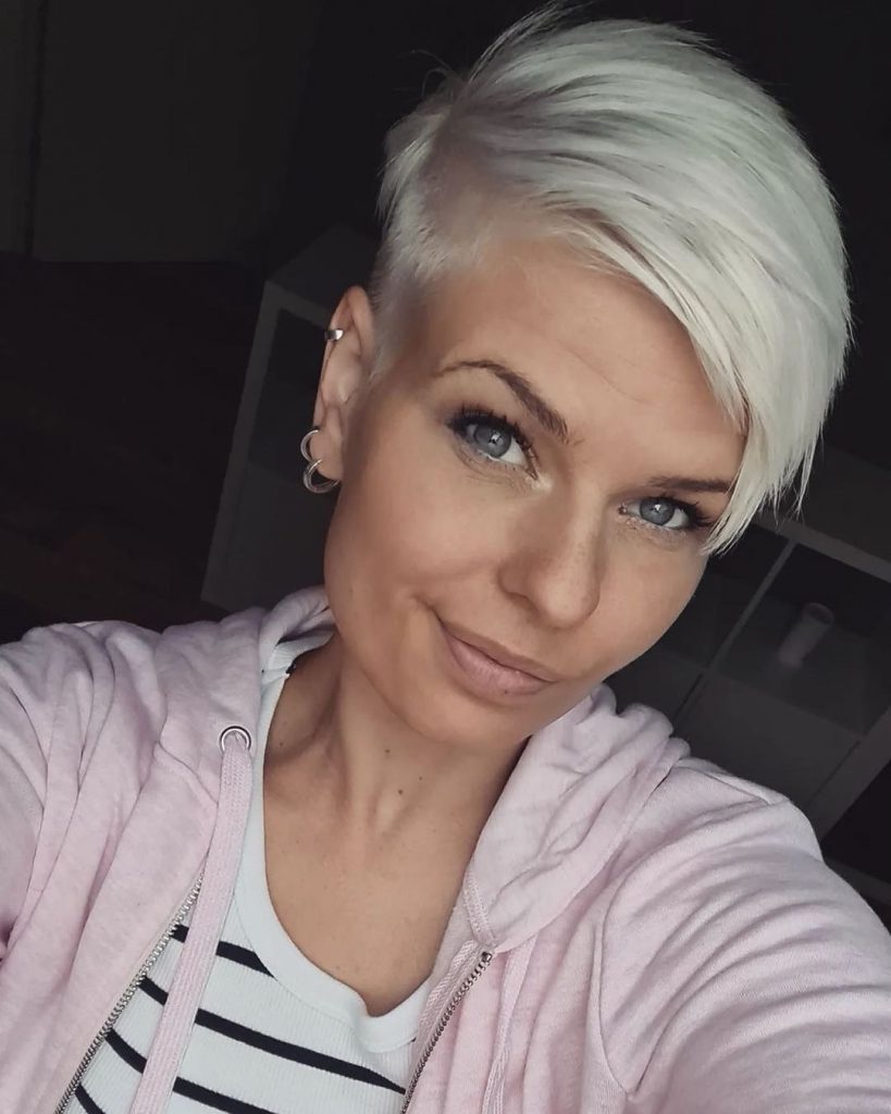 icy blonde pixie with deep side part