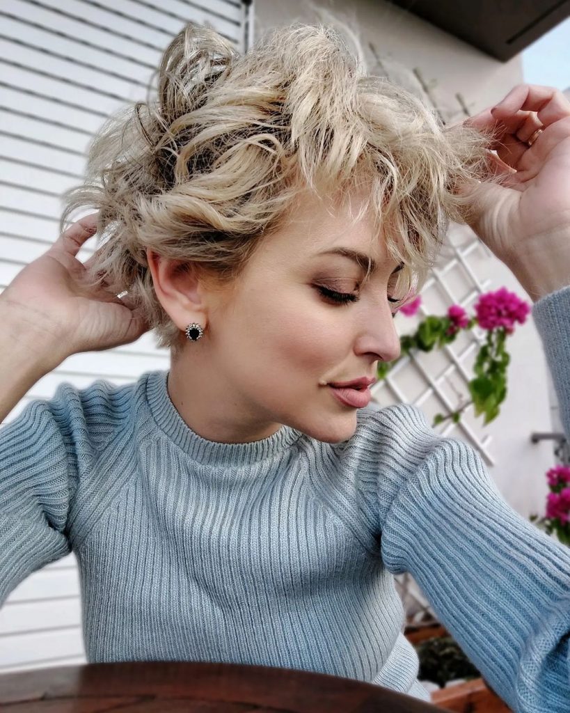 long curly blonde pixie with dark lowlights
