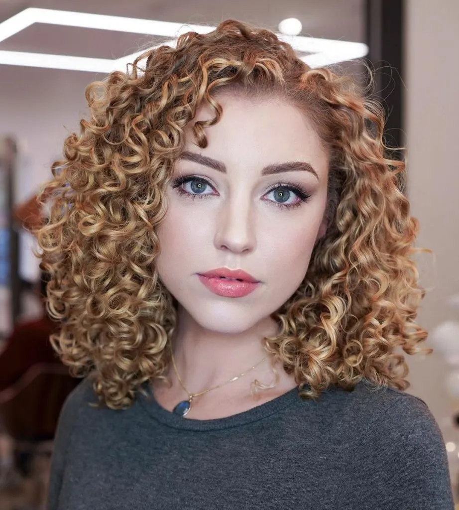 long curly bob with side part