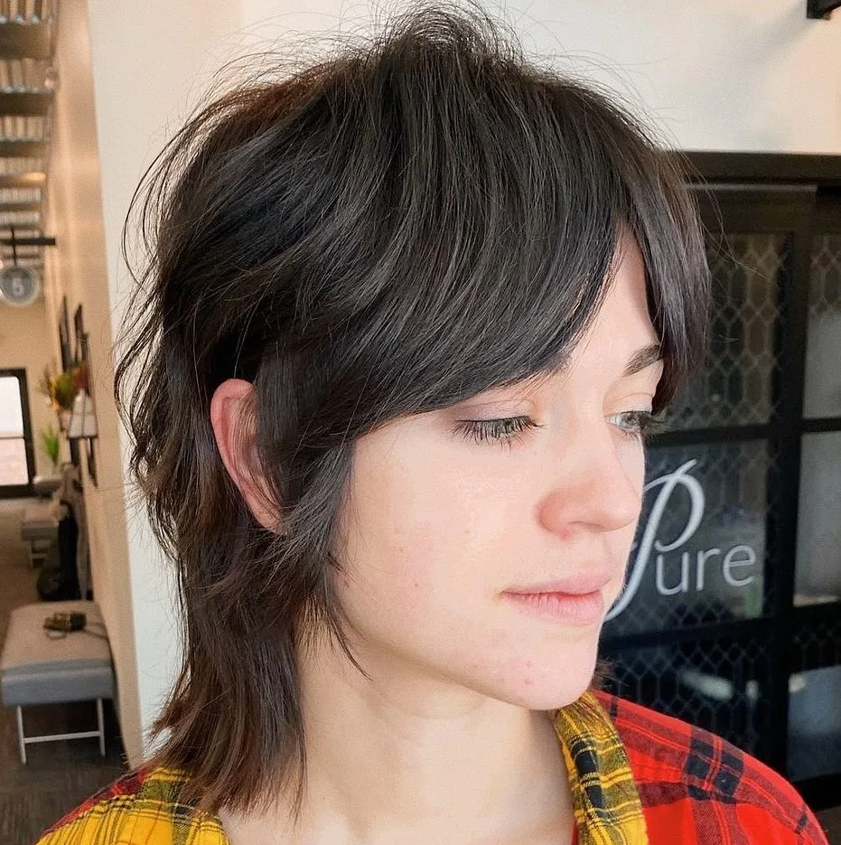 mullet hairstyle with curtain bangs