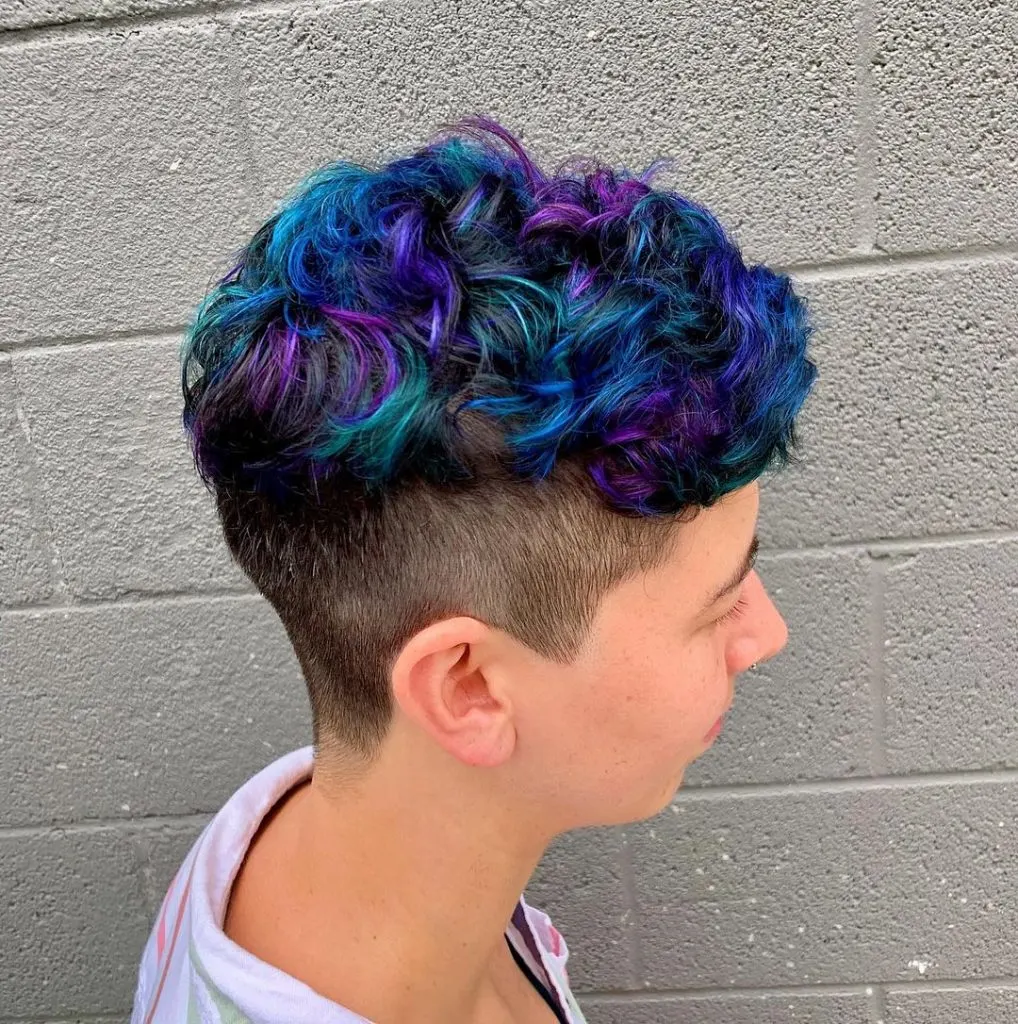 multicolored curly pixie cut with undercut