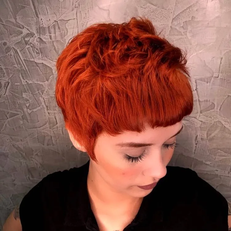 pixie cut for round face with straight bangs