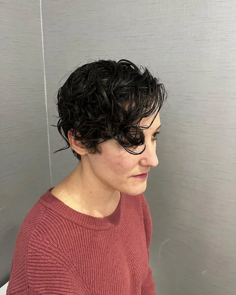 pixie cut with curly bangs