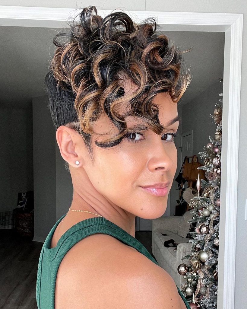 pixie cut with long curly bangs