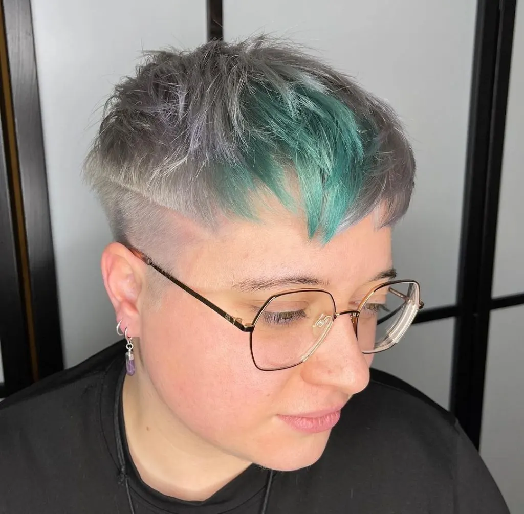 pixie for round face with edgy bangs
