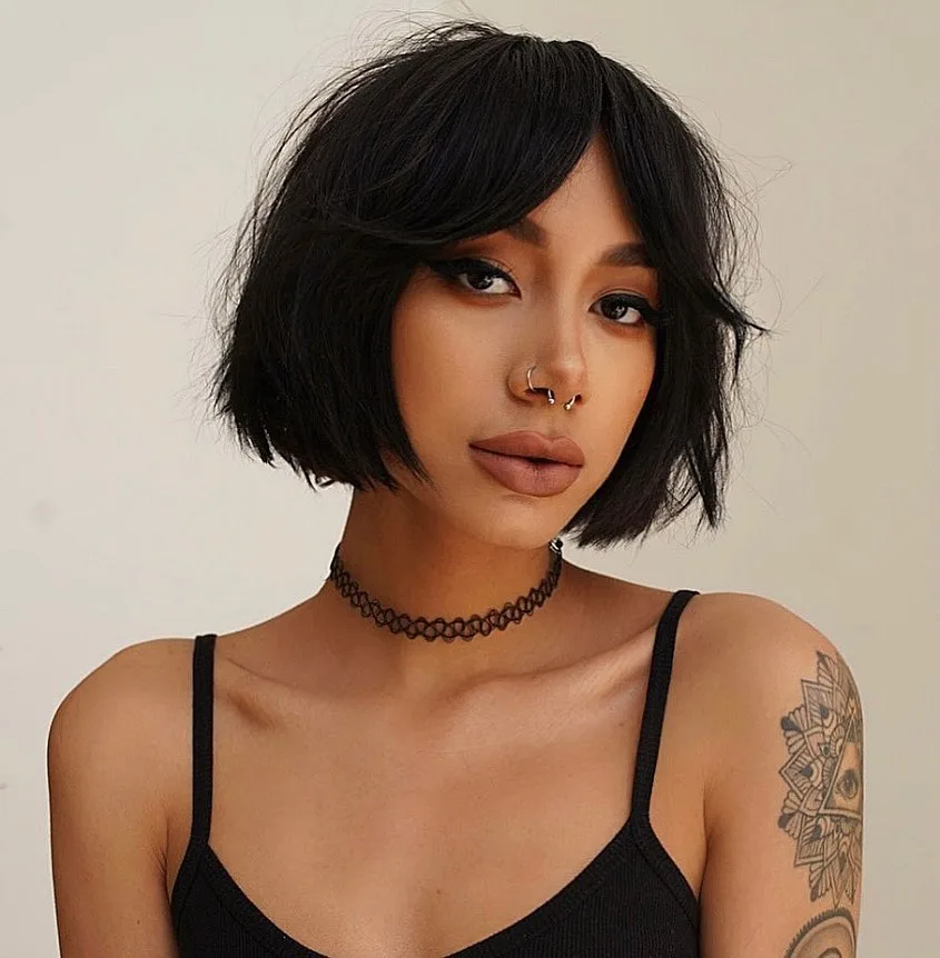 short blunt bob with baby curtain bangs