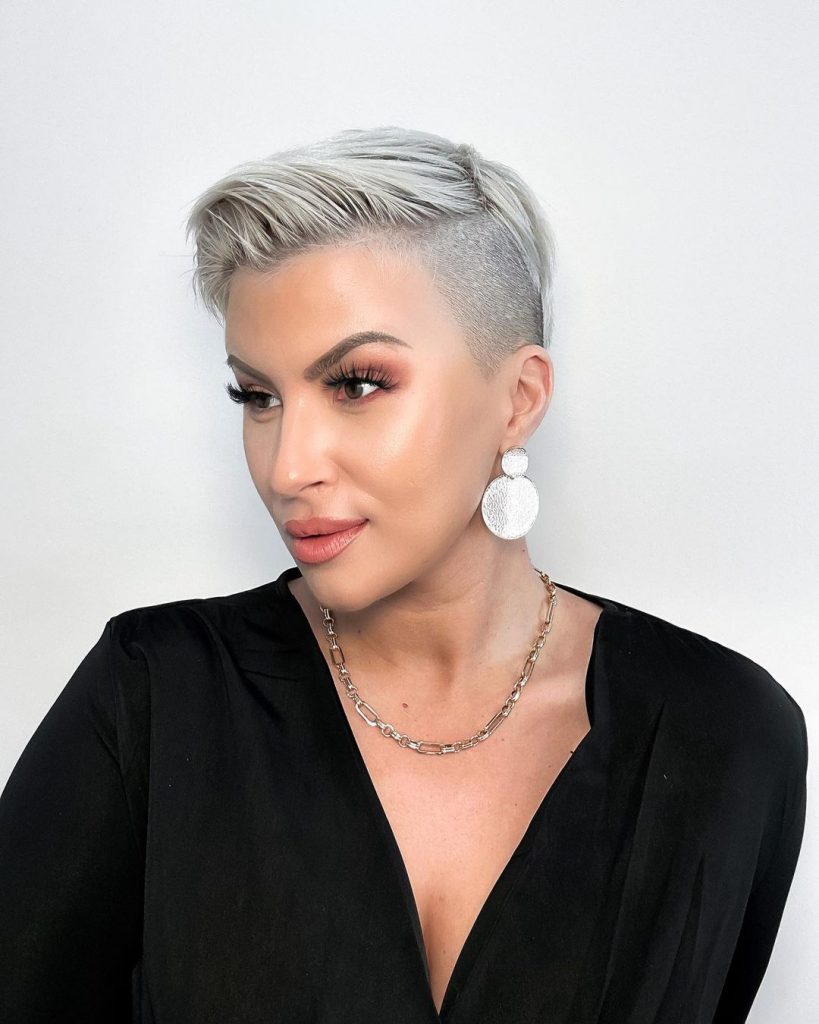 sleek icy blonde pixie with buzzed sides