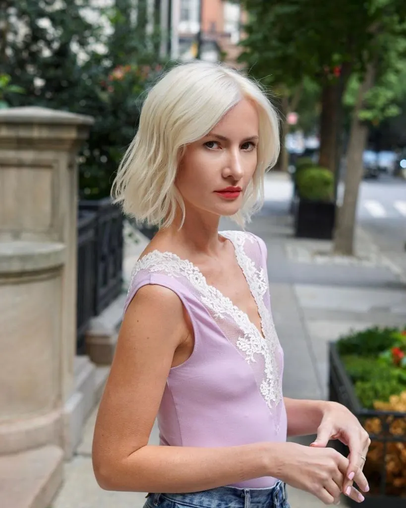 textured bob haircut with long bangs