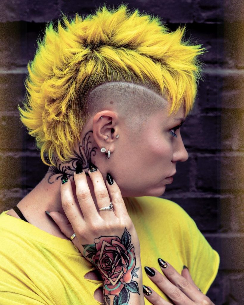yellow mohawk pixie cut with fade