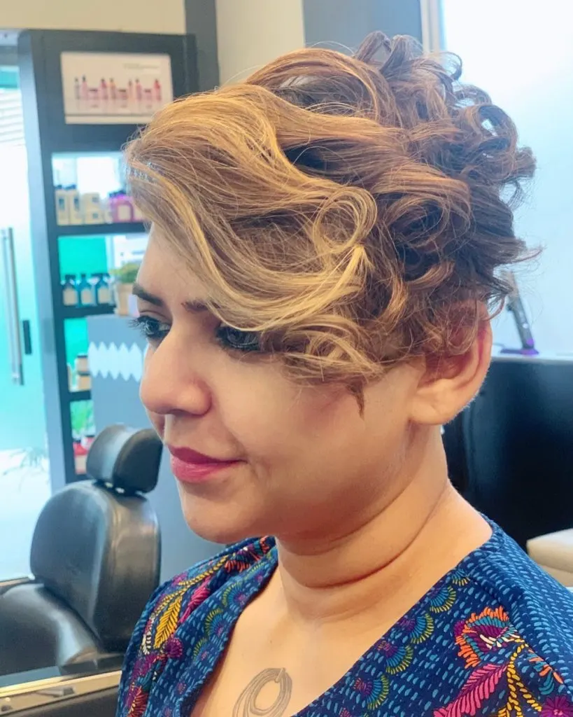 asymmetrical pixie cut with big curls