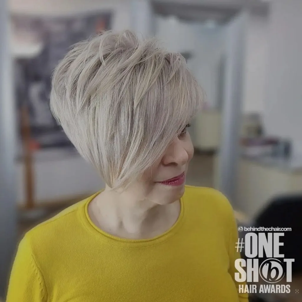 asymmetrical pixie cut with extra long side bangs