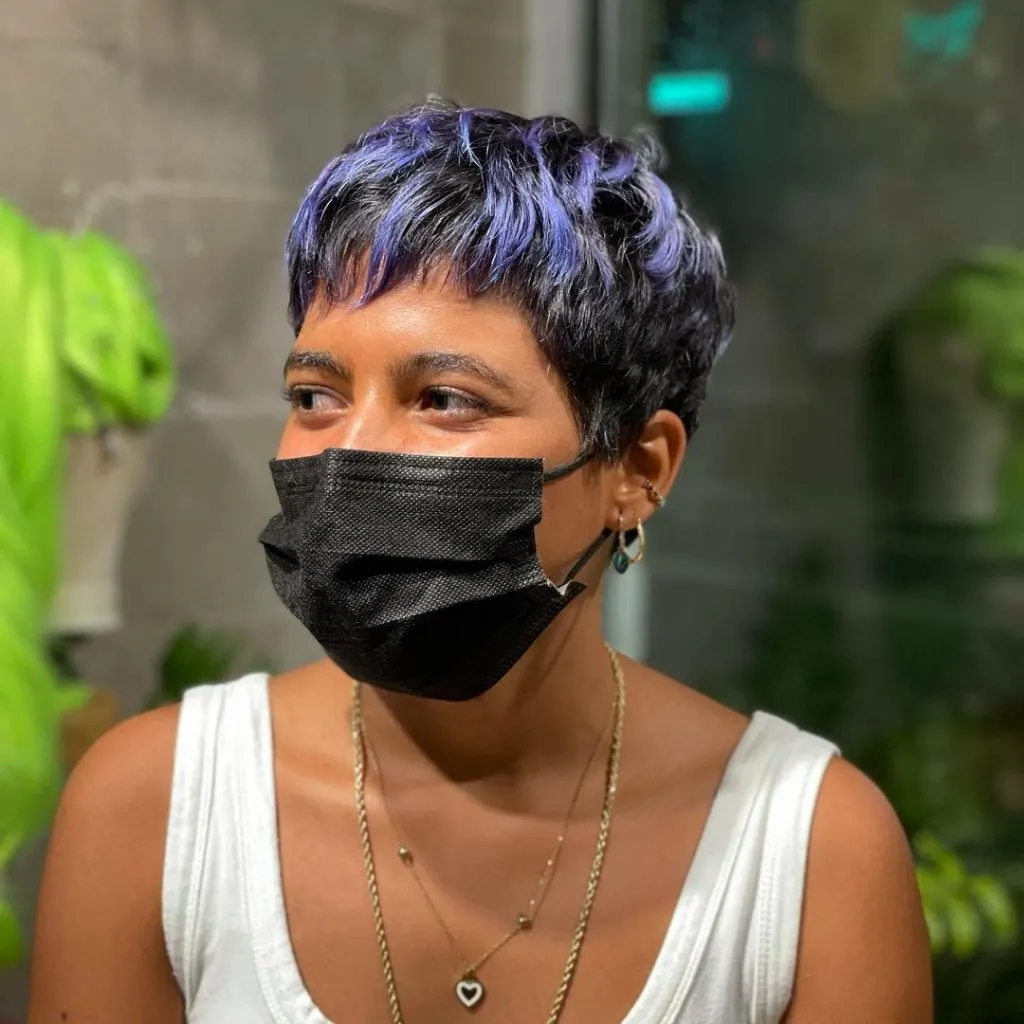 black choppy pixie with periwinkle bangs