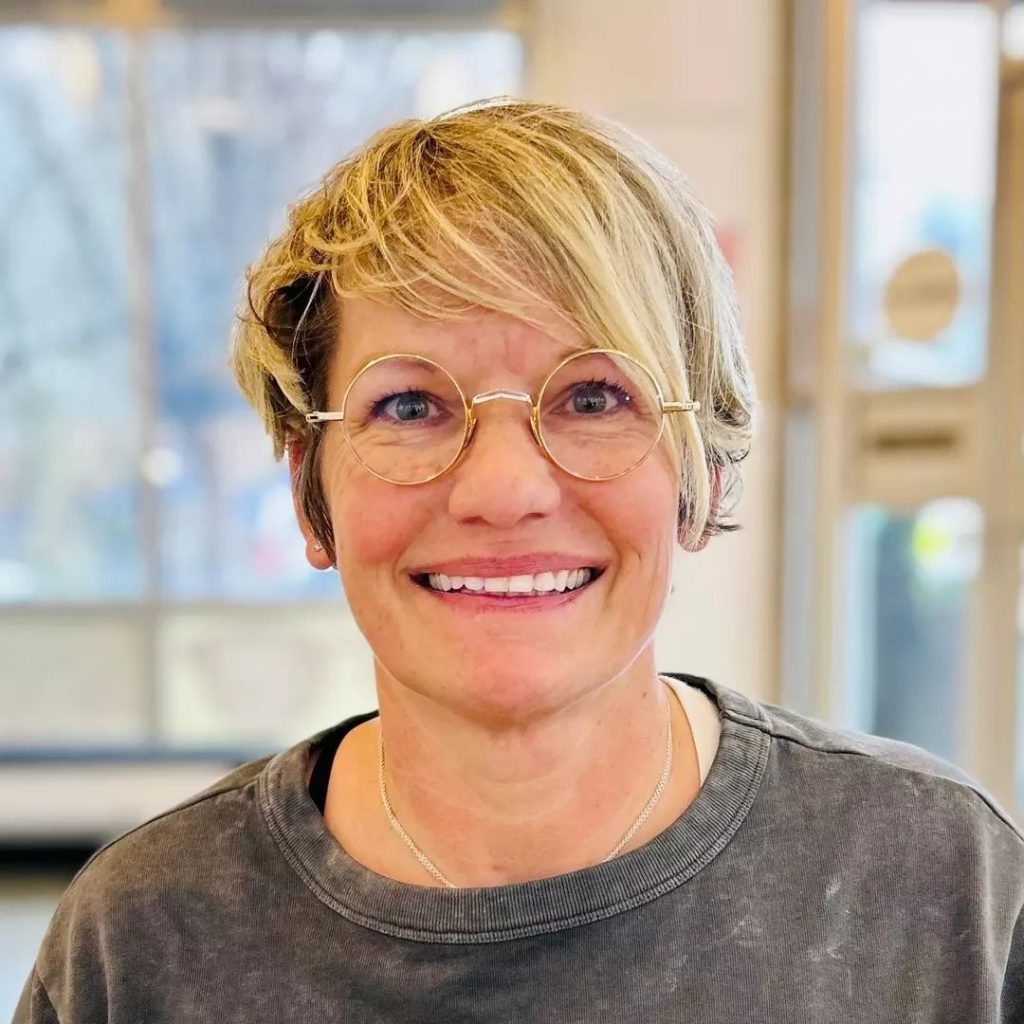blonde pixie cut for older ladies with glasses