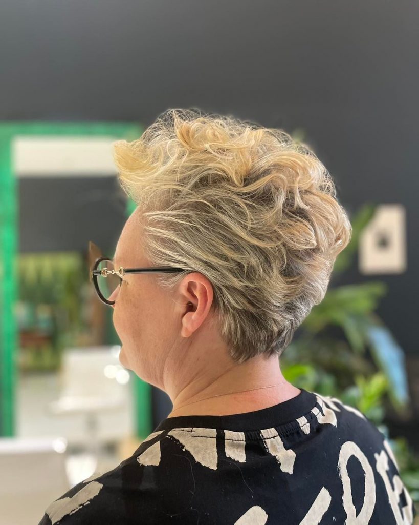 blonde pixie with highlights for older ladies with glasses