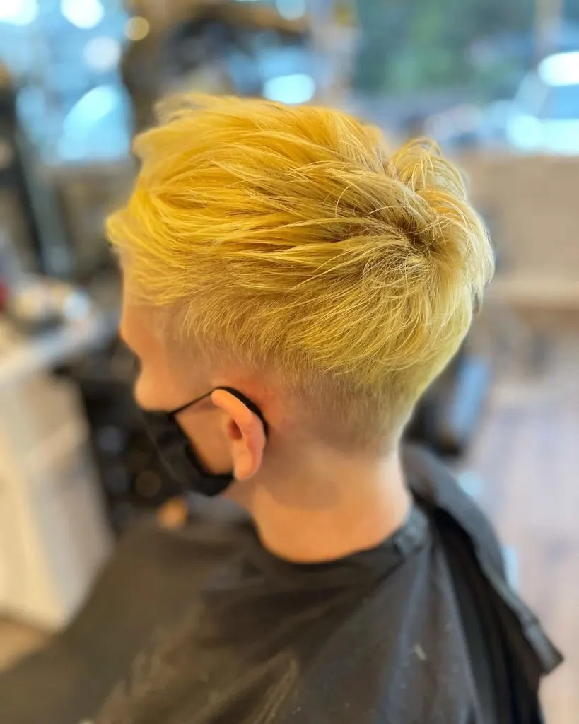 bright yellow choppy pixie cut