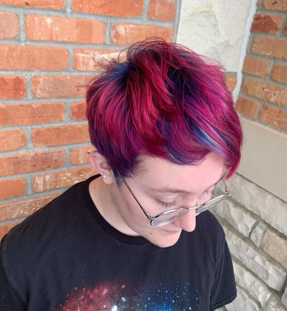 dark pink pixie cut with blue highlights