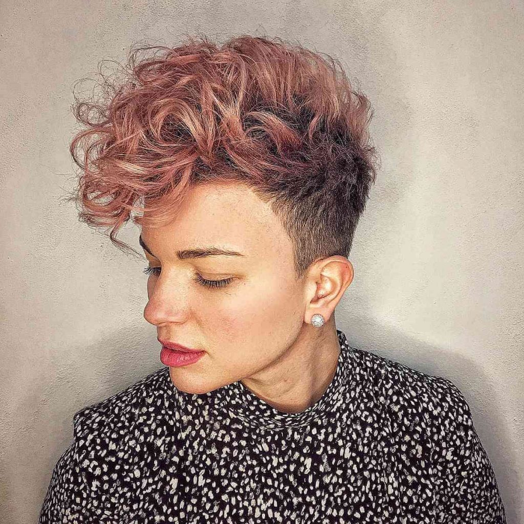 edgy curly pixie cut with shaved sides