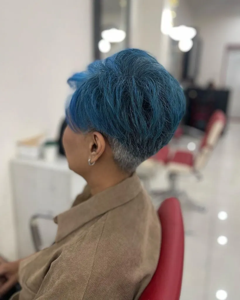 elegant blue pixie cut with gray tapered area