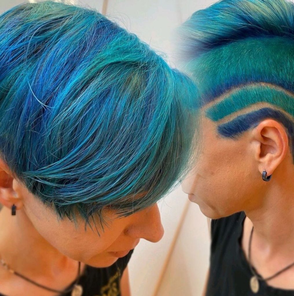 funky colored pixie cut with fades