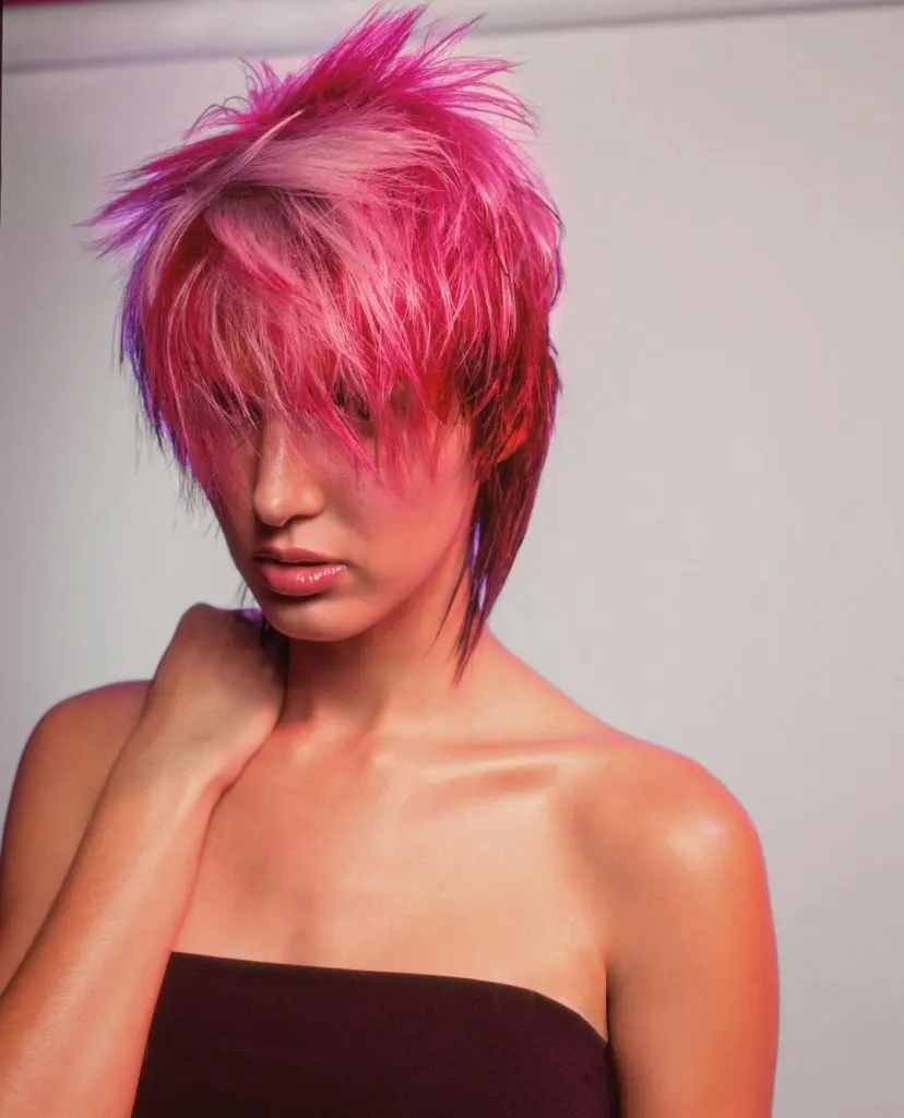 pink pixie cut with eye covering bangs