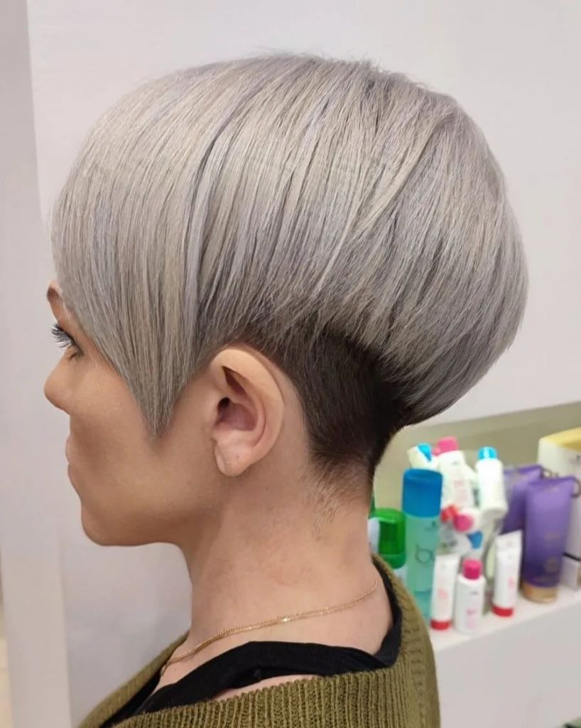 icy blonde asymmetrical pixie with tapered neck