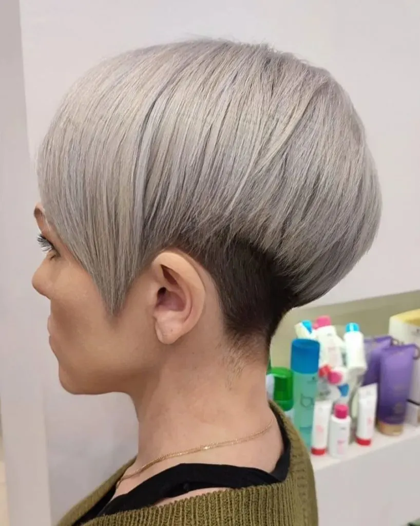 icy blonde asymmetrical pixie with tapered neck