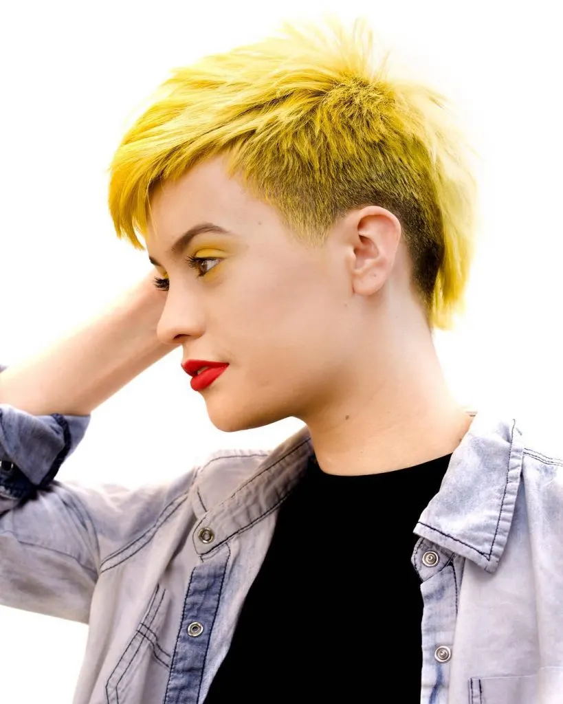 neon yellow pixie cut with short choppy sides