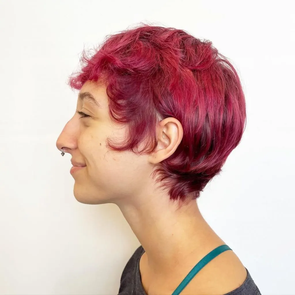 pink long pixie cut with shaggy bangs